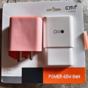 CMF Power 65W GaN charger is an ultra-compact, 3-port (2 USB-C + 1 USB-A) fast charger with universal compatibility and intelligent power distribution for optimal speed. Featuring 8 safety protections, it delivers rapid, safe charging for phones, tablets, earbuds, and notebooks--charging Nothing Phone (2) to 50% in 25 minutes. Features: 65 W GaN ultra fast charger 3 Port : 2 USB Type C and 1 USB A Port Ultra compact and portable Output current : 3A Universal voltage 8 protection technologies to ensure safest charging even at peak output One to Power All: 3-in-1 compact design 65W GaN ultra-fast charging wide compatibility. Universal compatibility:Your new travel companion. The CMF Power 65 GaN works with all major fast charging protocols. Compatible with MFI-certified cables, guaranteeing optimal performance accross a range of tech products. All-round protection: Rest assured, we've gone the extra mile to protect your devices. With safeguards against short circuits, overheating, excessive currents, high voltage, low voltage, interference, as well as flame retardant protection for the charger's outer shell. Charge more, carry less : Less is always more with the CMF power 65W GaN charger. Small, portables and beyond powerful, it's your new go-to. From phones and tablets to earbuds and notebooks, its two USB-C ports and USB-A port have you covered. Intelligent power distribution:Ensures the optima charging speed for all devices. 65W Fast Charging: Powered by the latest GaN tech for the fastest, safest and most energy efficient charging experience. Featuring robust thermal conductivity and high-tempreture resistance. Works hand-in-hand with a chip that can intelligently adjust voltage and current. The result is a powerhouse that can charge the Nothing Phone (2) smartphone up to 50 percent within 25 minutes.